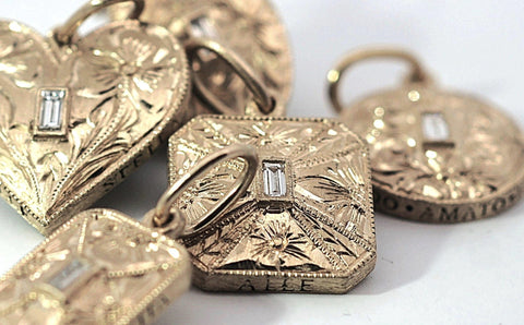 ERICAMOLINARI 18k Hand engraved diamond baguette charm collection.